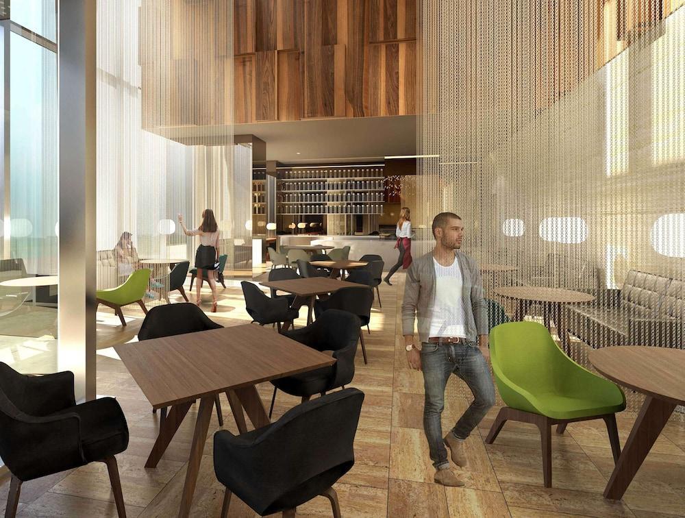 Aleph Doha Residences, Curio Collection By Hilton מראה חיצוני תמונה The interior of the new restaurant