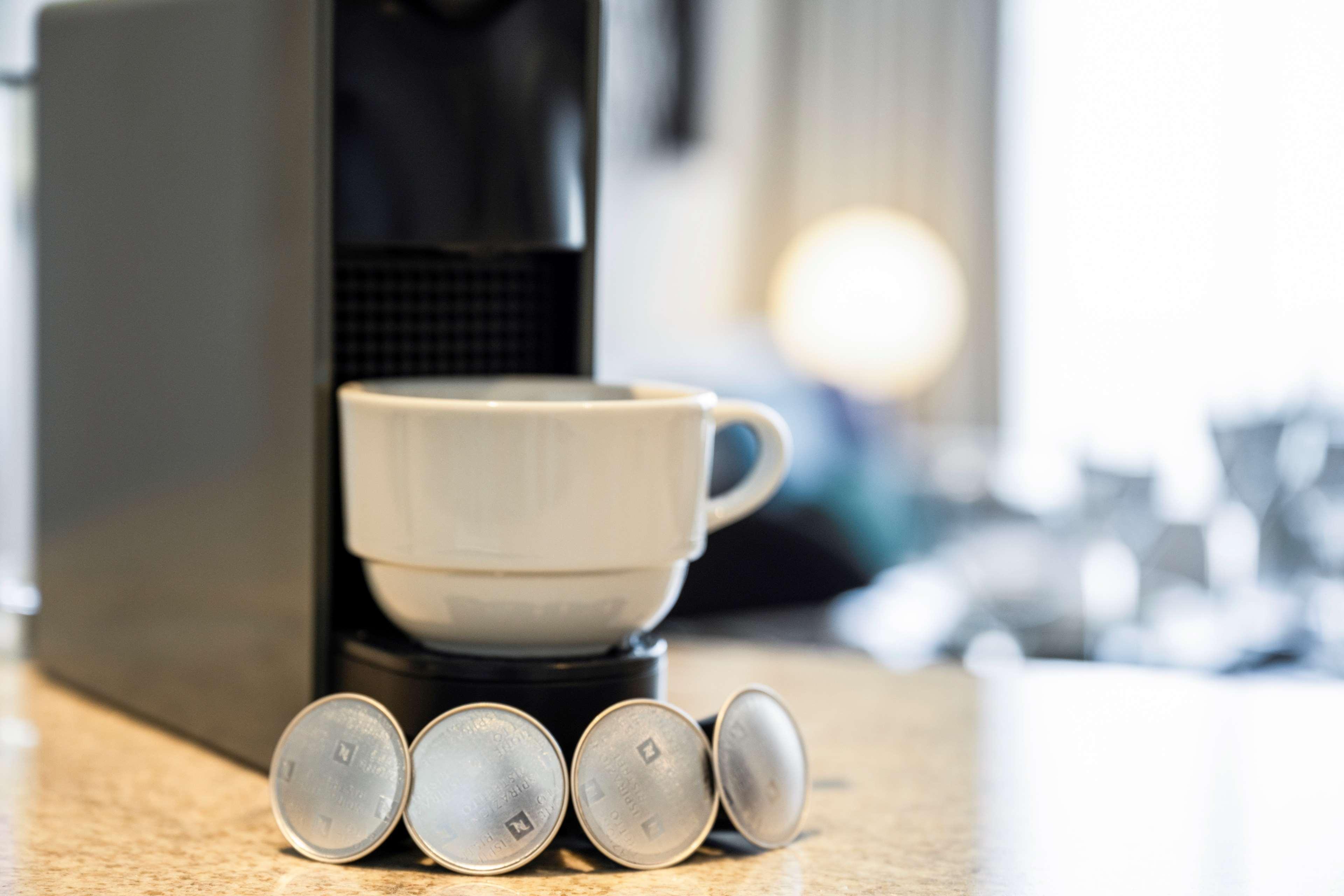 Aleph Doha Residences, Curio Collection By Hilton מראה חיצוני תמונה A Nespresso machine