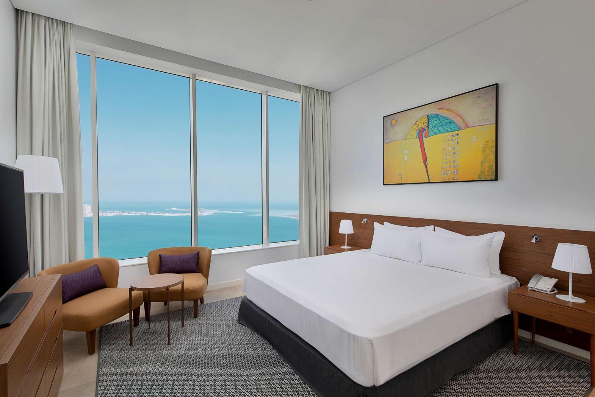 Aleph Doha Residences, Curio Collection By Hilton מראה חיצוני תמונה A bedroom at the hotel