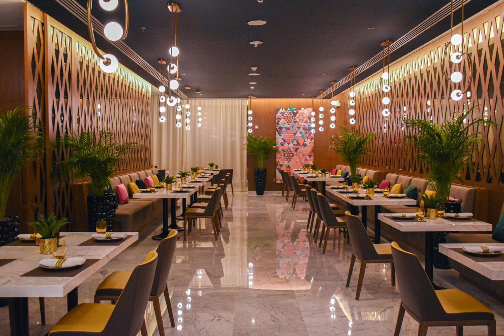 Aleph Doha Residences, Curio Collection By Hilton מראה חיצוני תמונה Restaurant interior