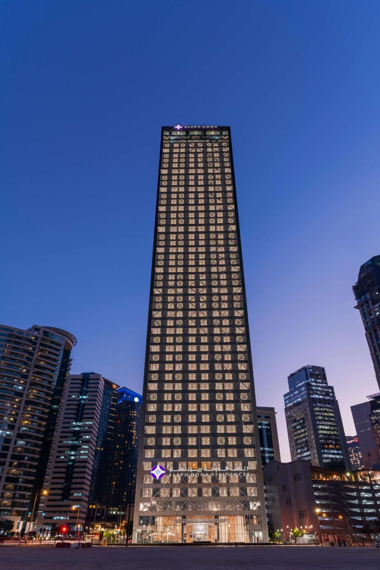Aleph Doha Residences, Curio Collection By Hilton מראה חיצוני תמונה The building at night